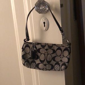 Brand new Coach wristlet